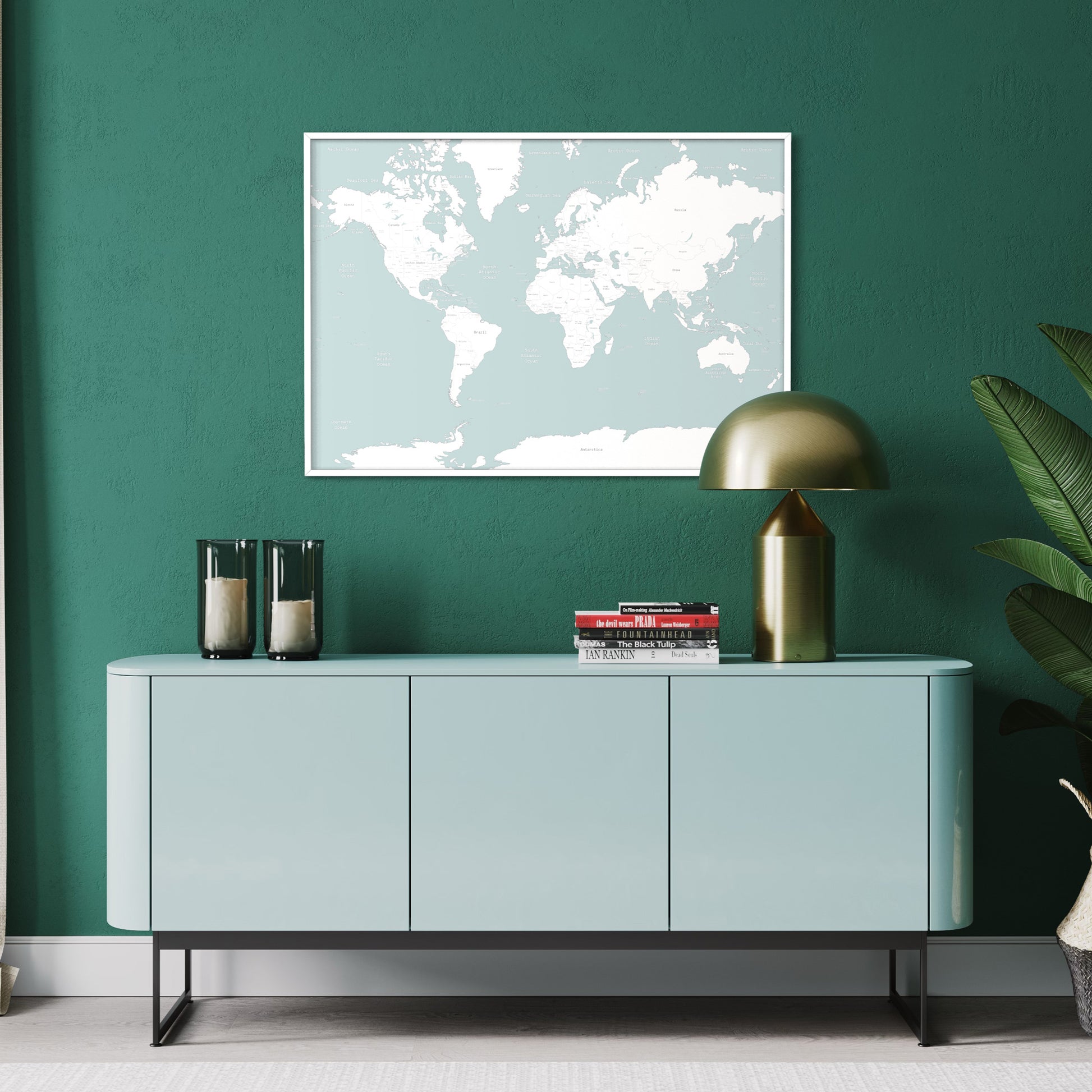 Pale Blue Map of the World Poster Print on Green Wall Above Sideboard