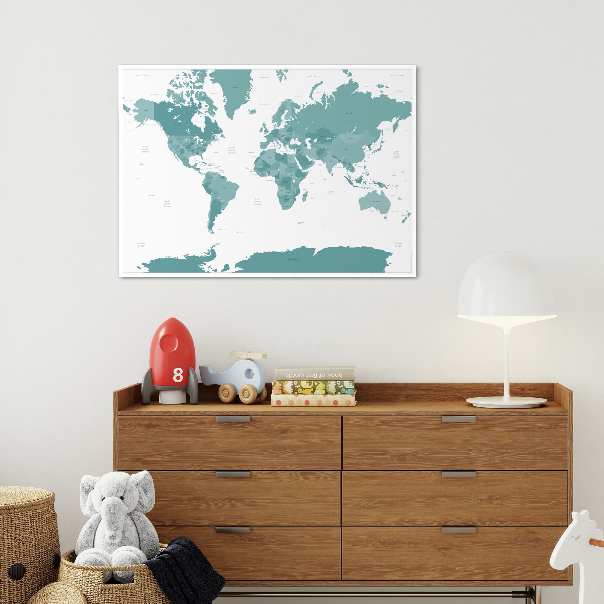Teal World Map On Nursery Wall Above Chest of Drawers